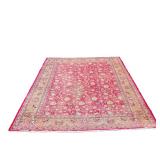 PERSIAN STYLE CARPET | Having an overall pattern with animals on a red ground within floral borders.
