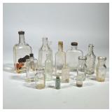 (13pc) MIXED ANTIQUE & OTHER CLEAR GLASS BOTTLES | Mixed lot of antique and other clear glass bottle
