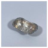 800 SILVER BOWL | Designed with stamped rose relief, marked on back “800” 0.4 ozt. - h. 0.75 x w. 1.