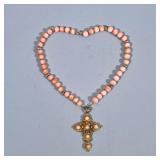 18K & 14K GOLD & CORAL CROSS | Designed as an 18K gold crucifix with carved coral beads marked “K18”