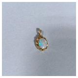 14K GOLD & OPAL PENDANT | Designed as a 14K yellow gold pendant with Opal mounting, marked “14K” tot