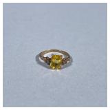 10K GOLD RING | Designed as a 10K gold ring with a faceted yellow stone, size 4.5, marked “10K” tota