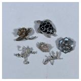 (6pc) STERLING & OTHER BROOCHES/PINS | Including: Sterling silver rose-form brooch marked “STERLING 