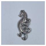 STERLING SILVER HORSE BROOCH | Designed as a Sterling silver horse/seashorse brooch/pin, marked on b