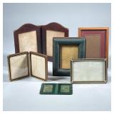 (6pc) PICTURE FRAMES | Including 2 leather-bound pair of folding frames, a formed brass frame, and m