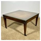 LEATHER TOP LOW TABLE | Inlay leather top with gilt border and carved flower corners. - h. 15.5 x w.
