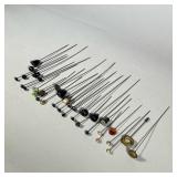 HAT PIN COLLECTION | Vintage hat pins, including an art nouveau-style flower pin, a brass eagle and 