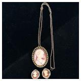 CAMEO JEWELRY | Including: carved Cameo pendant/brooch with mixed metal chain, and pair of cameo cli