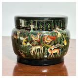 INDIAN LACQUERED BOX | Indian lacquered and gilt lidded box decorated with animals. - h. 4 x dia. 5 