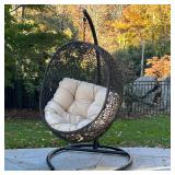 Outdoor Hanging “egg” Chair | Swing outdoor patio lounge chair having a woven frame with tufted seat