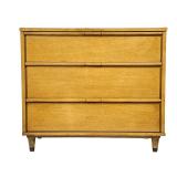MAINLINE MID-CENTURY CHEST OF DRAWERS | Three-drawer dresser in blonde wood, top with later glass. -
