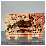 CHINESE SOAPSTONE TRIPLE VASE | Reticulated soapstone carving designed as two oval vases flanking a 