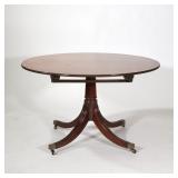 REGENCY STYLE PEDESTAL BREAKFAST TABLE | Round top table with inlaid wood border, over four reeded l