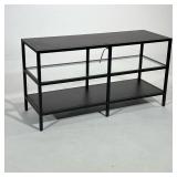CONTEMPORARY MEDIA STAND | Black metal TV stand having a dark faux wood top and lower shelf with a m