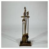 (5pc) ANTIQUE BRASS FIREPLACE TOOL SET | Four tools on a matching stand with scrolling acanthus hand