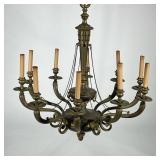 TEN LIGHT BRASS CHANDELIER | With faux candle electrified lights, scroll arms, decorated with chased