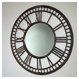 RUSTIC IRON CLOCK-FORM WALL MIRROR | Round wall mirror in the form of a clock face with Roman numera