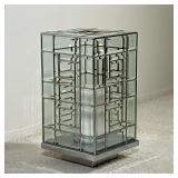 ARTFUL GLASS CANDLE HOLDER | Glass paneled box with a large candle in the middle on stainless steel 