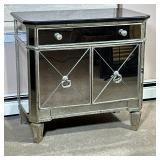 STONE TOP & MIRRORED CABINET | Side cabinet having a black stone top over full-width drawer and spli