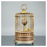 AUTOMATON CLOCK | Designed as a moving bird in a brass cage with a spherical revolving clock, no vis