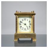 SMALL WATERBURY CARRIAGE CLOCK | A Waterbury Clock Co. Brass carriage clock with beveled glass panel