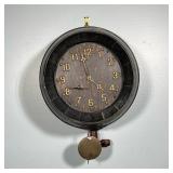 WINE BARREL FORM CLOCK | With applied brass Arabic numeral markers, old black paint, with old tap at
