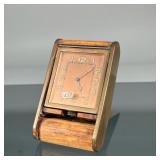 LE COULTRE TRAVEL CLOCK | Jaeger Le Coultre brass and wood folding travel clock, the copper face wit