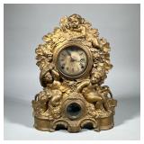 ITALIANATE METAL CLOCK WITH PUTTI | Noah Pomeroy, Bristol, CT circa 1847-78, gold-painted cast iron 