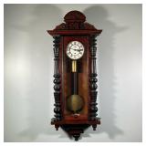VIENNA REGULATOR WALL CLOCK | With ebonized half columns, enameled face with sub-second dial and bla