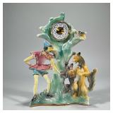 PORCELAIN FIGURAL CLOCK | Italian luster porcelain figural clock depicting Pinocchio and animals, th