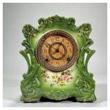 MASONIA PORCELAIN SHELF CLOCK | Green glazed porcelain shelf clock with flower decoration from Mason