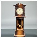 HOWARD POCKET WATCH & SAFE | A Howard gold-tone cased pocket watch with engraved decoration to case 