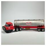 TEXACO TOY TRUCK | Texcaco tank trunk with a metal tank and a red plastic cab. - h. 6 x l. 23 in