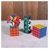 (4pc) Rubiks Cubes & Other | Including a Rubik’s cube and a Rubik’s Revenge Puzzle, and an Alexander