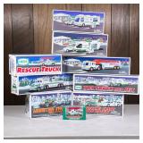 (9pc) Hess Trucks | Holiday Hess toy trucks, including a Monster Truck with Motorcycle, Rescue Truck