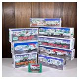 (9pc) Hess Trucks | Holiday Hess toy trucks, including a Monster Truck with Motorcycle, Rescue Truck