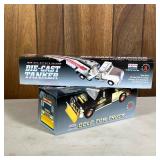 (2pc) Exxon Toy Trucks | A diecast tanker, 1999 collectors edition, and a gold tow truck with plow.