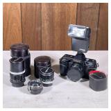 Rokinon 35mm SLR Camera | 35mm film camera by Rokinon with flash attachment and original box; plus t