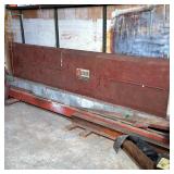 Bear Safety Service Door | Large metal door, with Bear Safety Service decal, hinges on one end, with