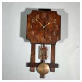 MISSION STYLE WALL CLOCK | Carved wood face with applied copper numeral markers, with mission-style 