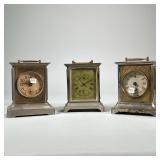 (3pc) METAL CARRIAGE CLOCKS | Including a Seth Thomas metal shelf clock with bell, a metal shelf clo
