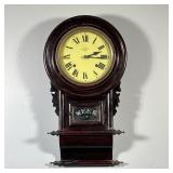 CARVED WOOD WALL CLOCK | "Week" spring driven carved wood wall clock. - h. 22 x w. 4 x l. 12 in
