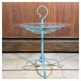 Outdoor Side Table | Cast iron scrolled top side table having a round glass top on a footed pedestal