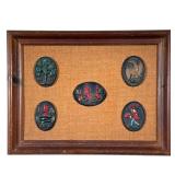 Framed Metal Plaques | Cold painted plaques on a woven jute backing in a wood frame, including an "F