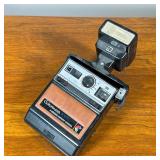 Kodak Instant Camera | Kodak Colorburst 100 instant film camera with flash mount.