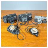 (5pc) Film Cameras & Meters | 35mm film cameras including a Nikeon Tele Touch camera, a Kodak VR 35,