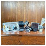 Group Camera Accessories | A large group of camera and photography accessories, including lenses, fi
