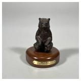 GITA PACKER BRONZE BLACK BEAR | “Black Bear” bronze statue by Gita Packer on wood base with brass pl