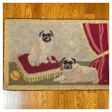 CLAIRE MURRAY HOOKED RUG | Hand-hooked rug by Claire Murray showing two pugs, initialed lower right.
