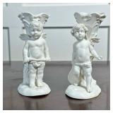 (2pc) PAIR PORCELAIN CUPID BUD VASES | Pair of porcelain bud vases with Cupid figure, each numbered 